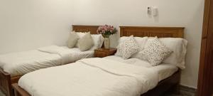 Postel nebo postele na pokoji v ubytování Hoang Phuc resort