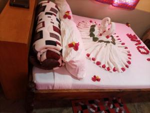 a cake shaped like a woman in a dress at Teen Ranch Kenya in Amboseli