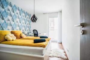 En eller flere senge i et værelse på Vig Apartment - with Private Parking