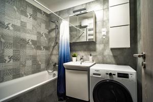 Et badeværelse på Vig Apartment - with Private Parking