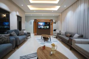 Ruang duduk di مزرعة وفيلا الريان وادي رم
