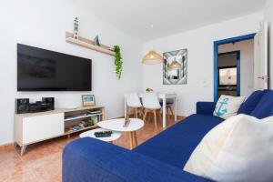 TV a/nebo společenská místnost v ubytování Home2Book Casa La Pepita 2
