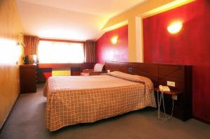 Postel nebo postele na pokoji v ubytování Hotel Villa De Nava