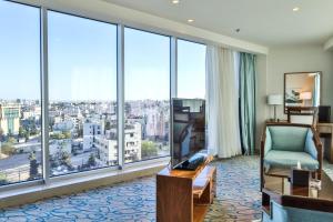 a hotel room with a view of a city at Coral Tower Hotel by Hansa in Amman