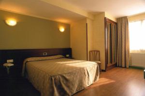 Postel nebo postele na pokoji v ubytování Hotel Villa De Nava
