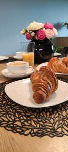 Options de petit-déjeuner proposées aux clients de l'établissement Nowoczesny apartament z widokiem na park