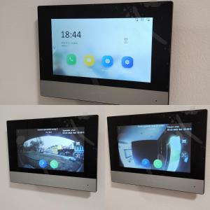 zwei Tablet-Computer auf einer Wand in der Unterkunft Apartman Park Lake in Tuzla