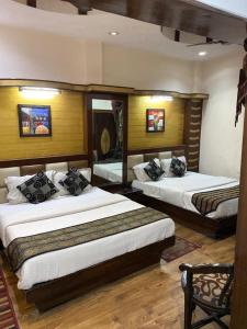 Postel nebo postele na pokoji v ubytování Hotel Roma Deluxe - New Delhi Railway Station