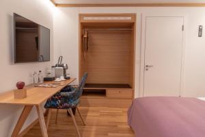 Ein Bett oder Betten in einem Zimmer der Unterkunft CASPAR Swiss Quality Hotel