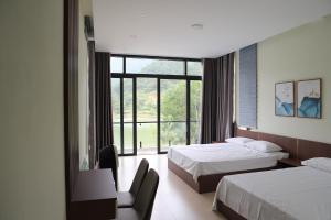 Postel nebo postele na pokoji v ubytování Summerly Villa Dong Do - Venuestay + 52 fotografií