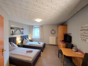 Krevet ili kreveti u jedinici u okviru objekta 3 Raben - Leoben - Zimmer für Geschäftsreisende, Urlauber, Monteure und Handwerker, Polski Pensjonat Austria