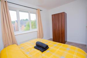 Postel nebo postele na pokoji v ubytování Intellect Suites