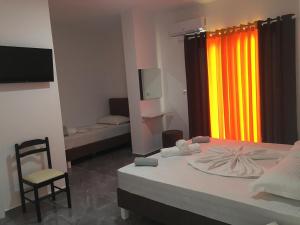 Postel nebo postele na pokoji v ubytování Hotel SEADEL