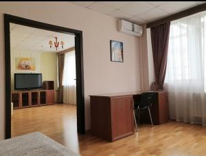 TV a/nebo společenská místnost v ubytování Hotel Obolon-Arena + 24 fotografií