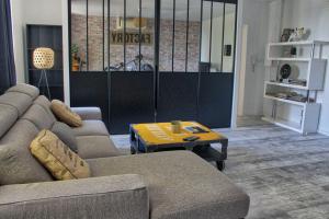 Зона вітальні в The Loft Factory 4 Chambres Vue Garonne + Jardin