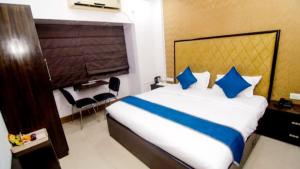 Postel nebo postele na pokoji v ubytování Hotel Roma Deluxe - New Delhi Railway Station