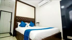Postel nebo postele na pokoji v ubytování Hotel Roma Deluxe - New Delhi Railway Station