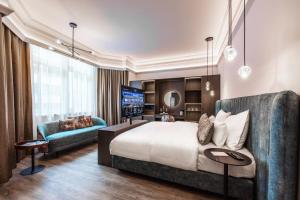 Postel nebo postele na pokoji v ubytování O11 Boutique Hotel Vienna