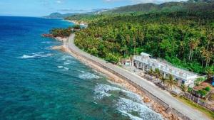 an aerial view of a beach and the ocean at Hotel Eight Fifty in Jagna