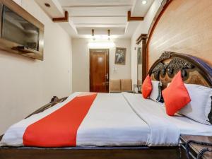 Postel nebo postele na pokoji v ubytování Hotel Roma Deluxe - New Delhi Railway Station