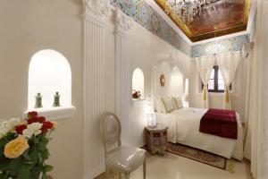 Riad Palais Des Princesses & Spa客房内的一张或多张床位