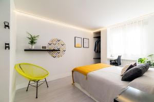 Posteľ alebo postele v izbe v ubytovaní Apartamento inteligente con vistas a la Alhambra