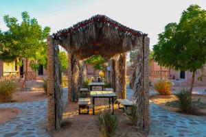 En hage utenfor Sama al Wasil Desert Camp