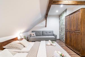 Posteľ alebo postele v izbe v ubytovaní Apartmány in Veritas