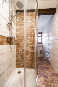 Koupelna v ubytování Apartmány in Veritas + 29 fotografií