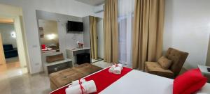 Postel nebo postele na pokoji v ubytování IL GIGLIO B&B