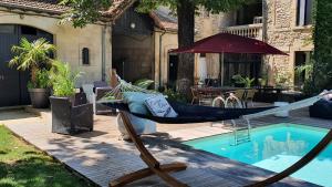 Bazén v ubytování Le 4 Feuilles en.Camargue nebo v jeho okolí