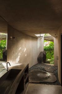 a bathroom with a sink and a sink at Casa Sua in Famara