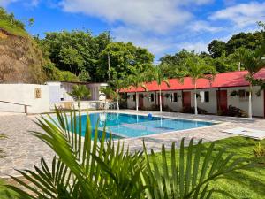 Bazén v ubytování Cabañas Orlando y Más Na' Tayrona nebo v jeho okolí
