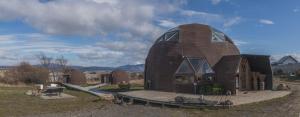 a house with a dome on top of it at Domos by Toore Patagonia in Puerto Natales