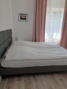 Posteľ alebo postele v izbe v ubytovaní Pokoje u Honi