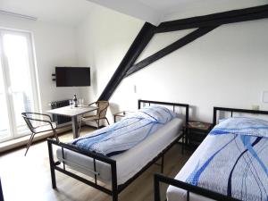 Postel nebo postele na pokoji v ubytování Eventhotel Ö - Cappuccino
