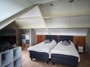Ένα ή περισσότερα κρεβάτια σε δωμάτιο στο My Lodge