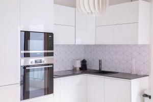 Kuchyňa alebo kuchynka v ubytovaní Dream Apartment by Halldis