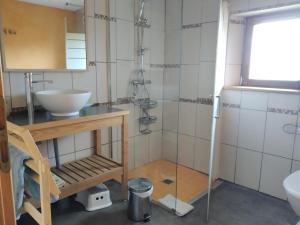 Koupelna v ubytování Les Troglogîtes