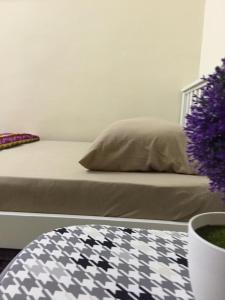 Ένα ή περισσότερα κρεβάτια σε δωμάτιο στο Little Cosy House @RB