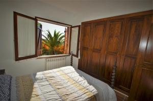 Postel nebo postele na pokoji v ubytování VILLA FLORES 8 personas LLORET DE MAR