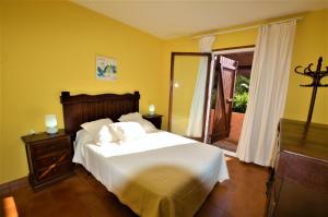 Postel nebo postele na pokoji v ubytování VILLA FLORES 8 personas LLORET DE MAR