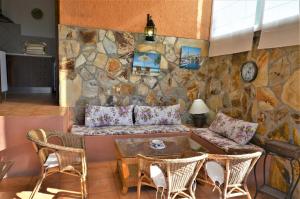 Posezení v ubytování VILLA FLORES 8 personas LLORET DE MAR