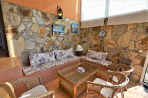 Posezení v ubytování VILLA FLORES 8 personas LLORET DE MAR + 37 fotografií