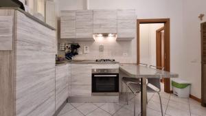 A kitchen or kitchenette at Al Trionfo 3