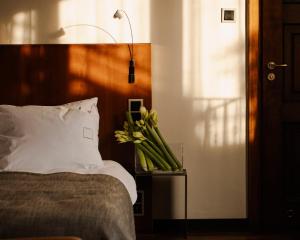 Łóżko lub łóżka w pokoju w obiekcie Hotel Copernicus