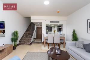 Posezení v ubytování Prime Select Porto New Cairo