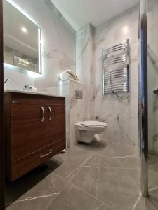 Koupelna v ubytování Apartman "MiLa" - Titova vila Zlatibor