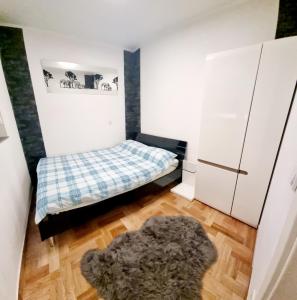Postel nebo postele na pokoji v ubytování Apartman Croatea