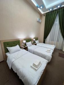 Postel nebo postele na pokoji v ubytování HOTEL DaMir + 35 fotografií
